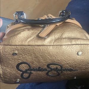 Lightly used purse bronze and black